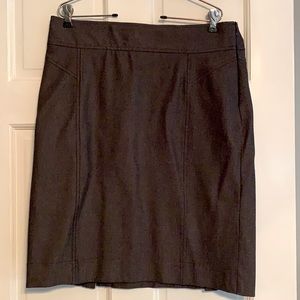 Woman’s gray fitted skirt